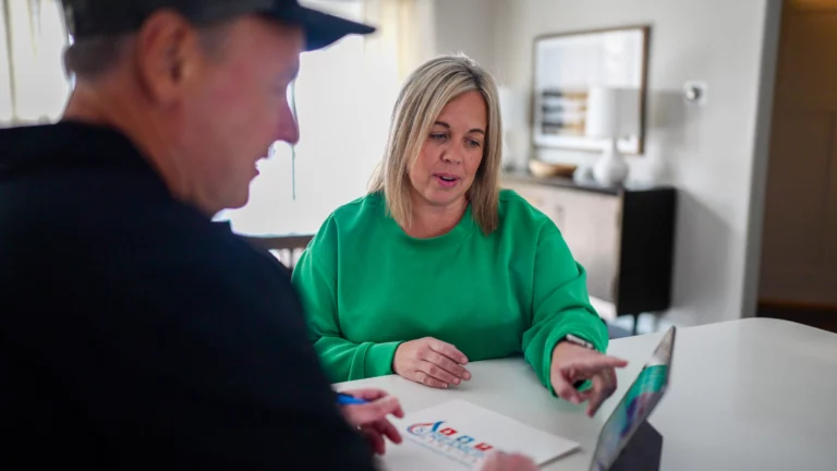 streamline services home service technician meeting with homeowner to go over repair, installation & replacement options