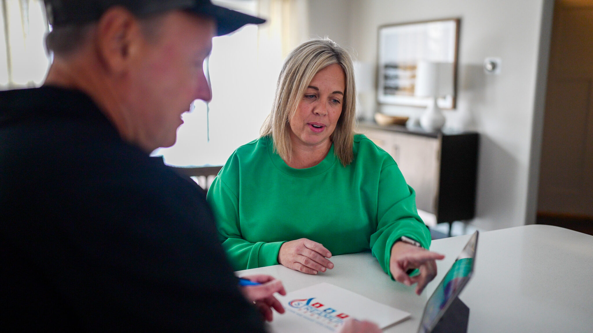 streamline services home service technician meeting with homeowner to go over repair, installation & replacement options